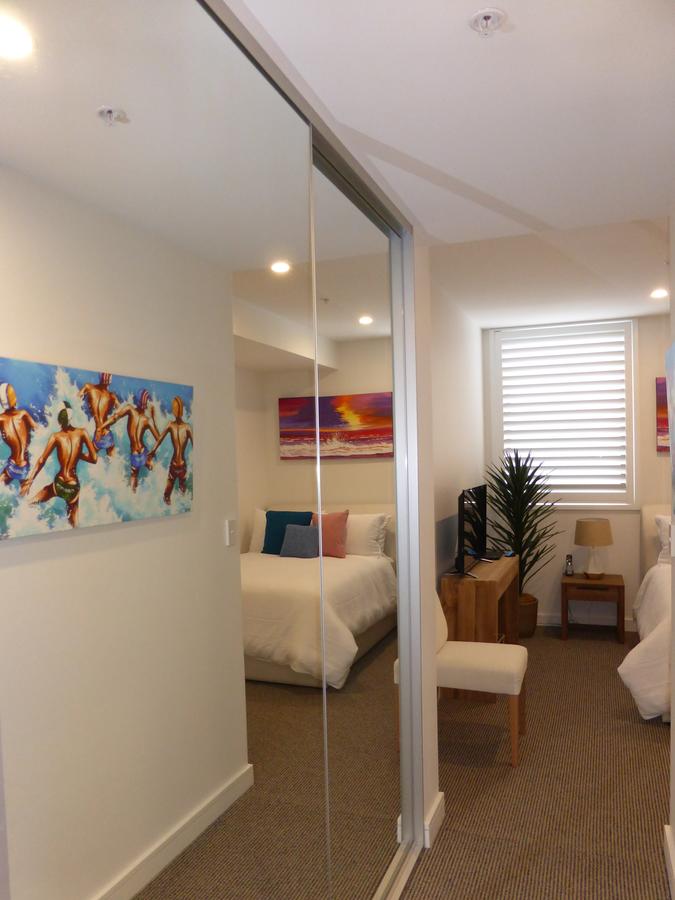 Arena Luxury Beachfront Apartment - Accommodation Find 28