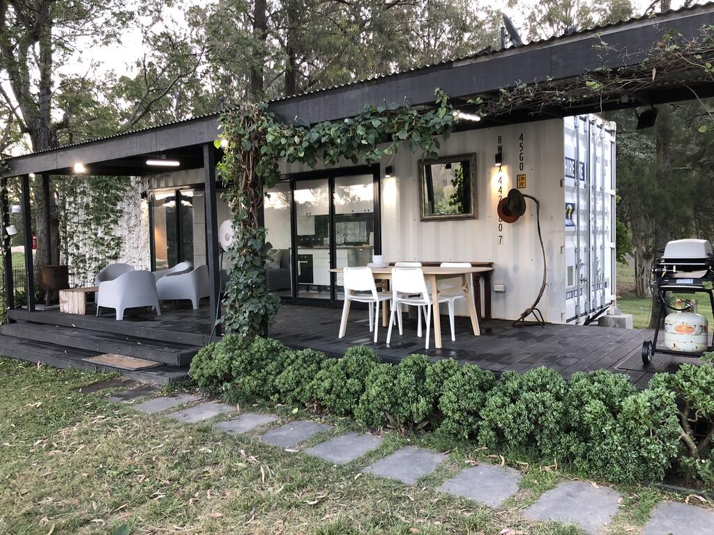 Absolute riverfront shipping container cabin - Holiday Byron Bay